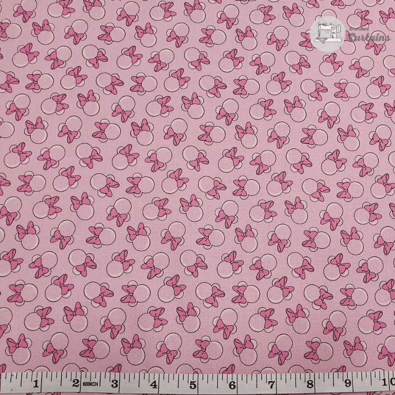 This cotton print fabric from the Minnie Mouse Unicorn Dreams collection, licensed to Camelot Fabrics by Disney, will delight children of all ages. It is ideal for quilting, clothing, and home decor accents. This is a licensed fabric that should not be used for commercial purposes.