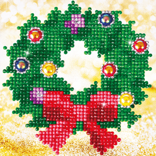 The Diamond Dotz Christmas Wreath Kit comes with everything you need to finish the project. It's simple, quick, and enjoyable to do!