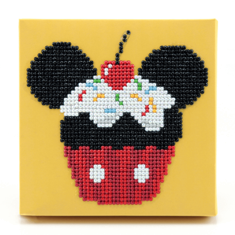 Diamond Dotz® Cupcake Mickey Mouse Box comes pre-folded and ready to hang or sit on your desk.  With the Diamond Dotz Box 15cm x 15cm, you may enjoy the art of diamond dotting while also creating visually appealing decorative artwork.