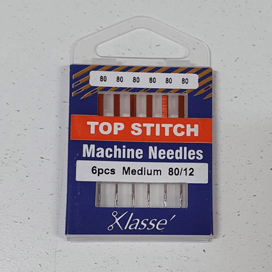 Klasse Top Stitch Machine Needles 80/12. The extra-large eye accommodates thick topstitching thread. The extra sharp point allows the needle to penetrate easily through medium to heavy fabrics. It is best for top-stitching, sashiko & blanket stitching.