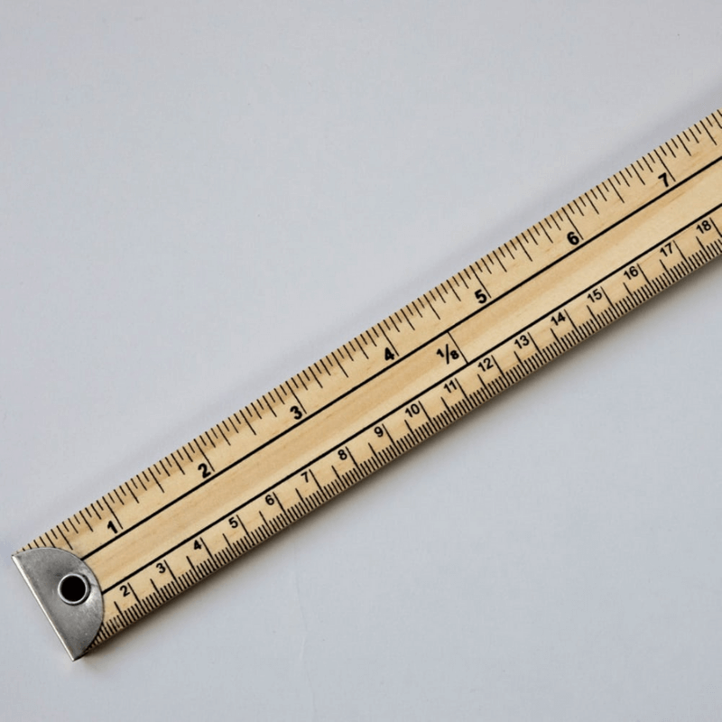 Made from high-quality timber featuring both metric and imperial measurements, this metre ruler is perfect for pattern cutting, dressmaking and craft use. It features brass ends with hanging holes making it easy to store.