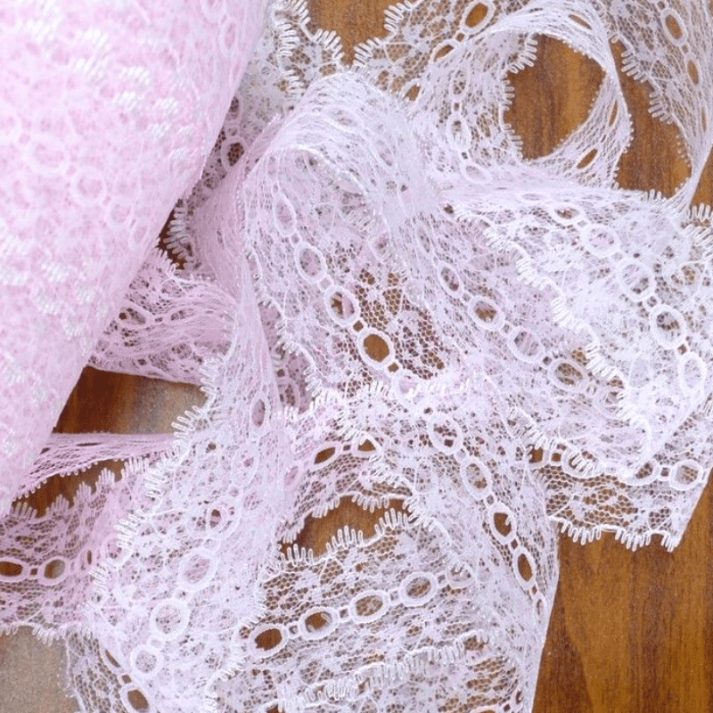 Uni-Trim Eyelet Lace Iridescent Pink is used to decorate coat hangers, tissue boxes, toilet roll holders, tea pot cosies, table runners and more.