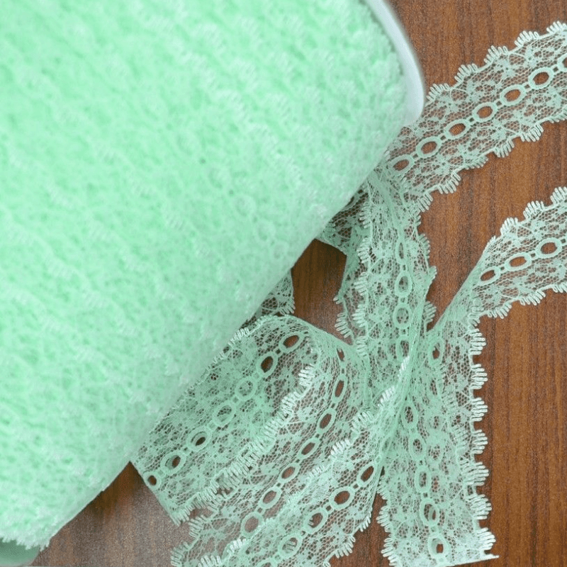 Uni-Trim Eyelet Lace Iridescent Plain Mint is used to decorate coat hangers, tissue boxes, toilet roll holders, tea pot cosies, table runners and more.