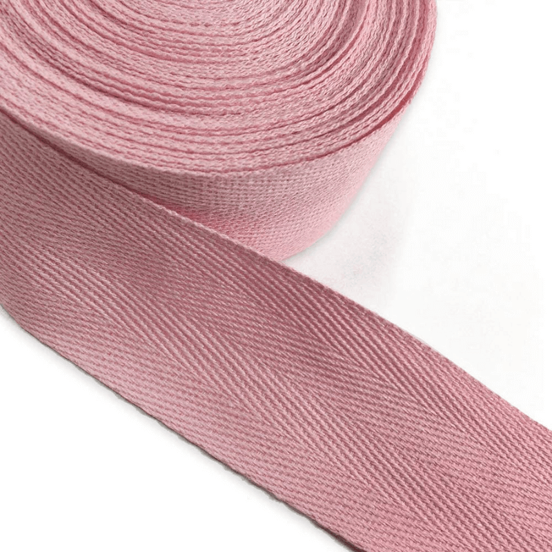 Uni-Trim Herringbone Polyester Tape used in sewing and tailoring to reinforce seams, make casings, bind edges and as a sturdy tie on garments.